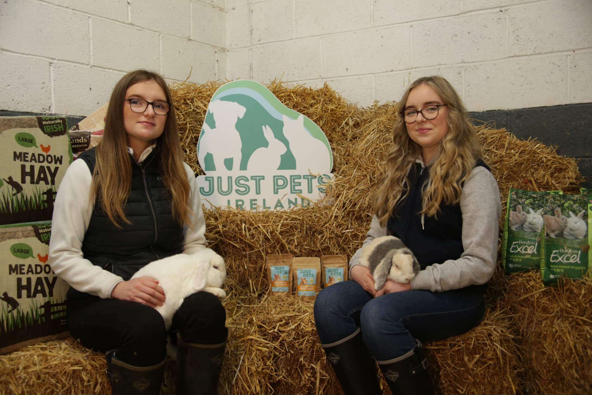 Emma and family with their rabbits and Just Pets Ireland supplies